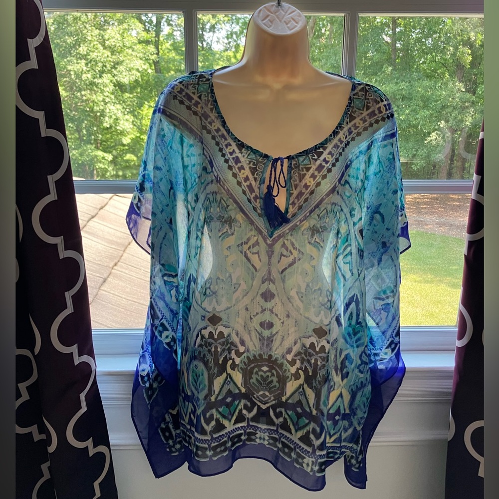 Fluid blouse blue with patterns
